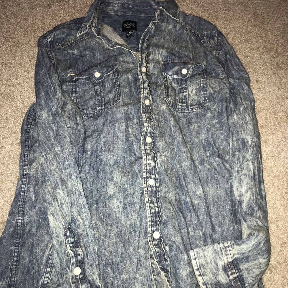 Distressed blue jean type shirt